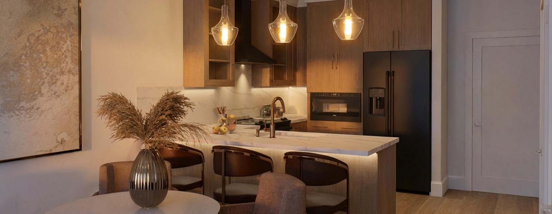 a kitchen with a dining table and a large island