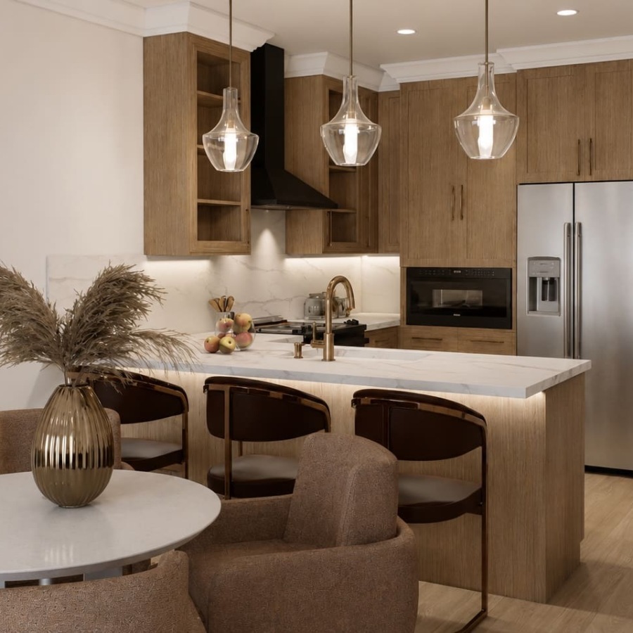 a kitchen with a table and chairs