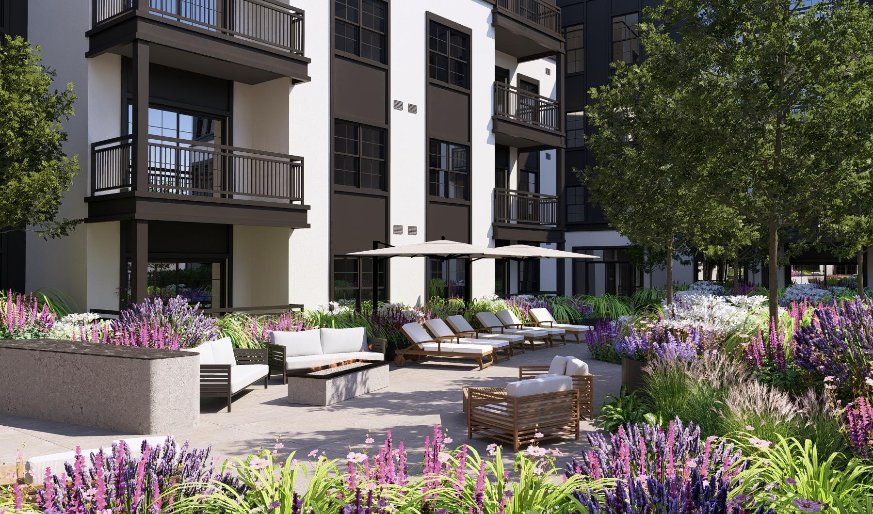 a courtyard with a building in the background